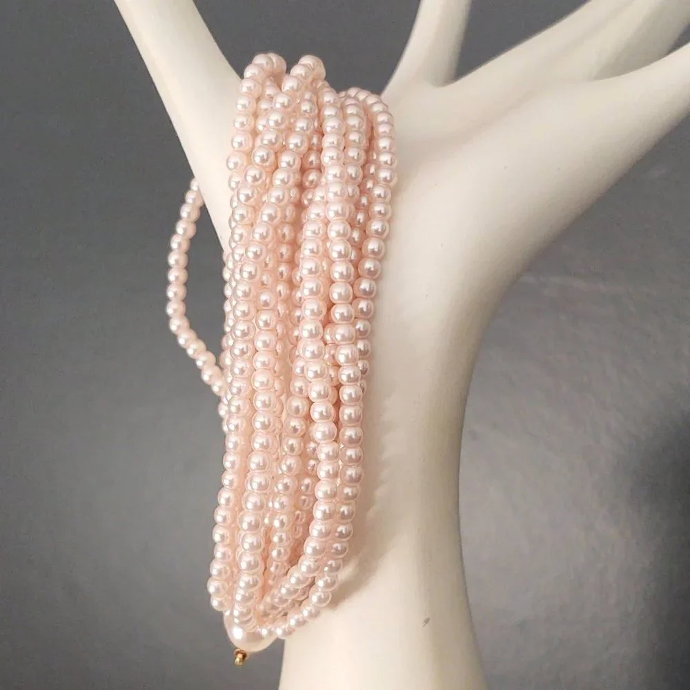 Vintage multi strand pink beaded necklace and bracelet set